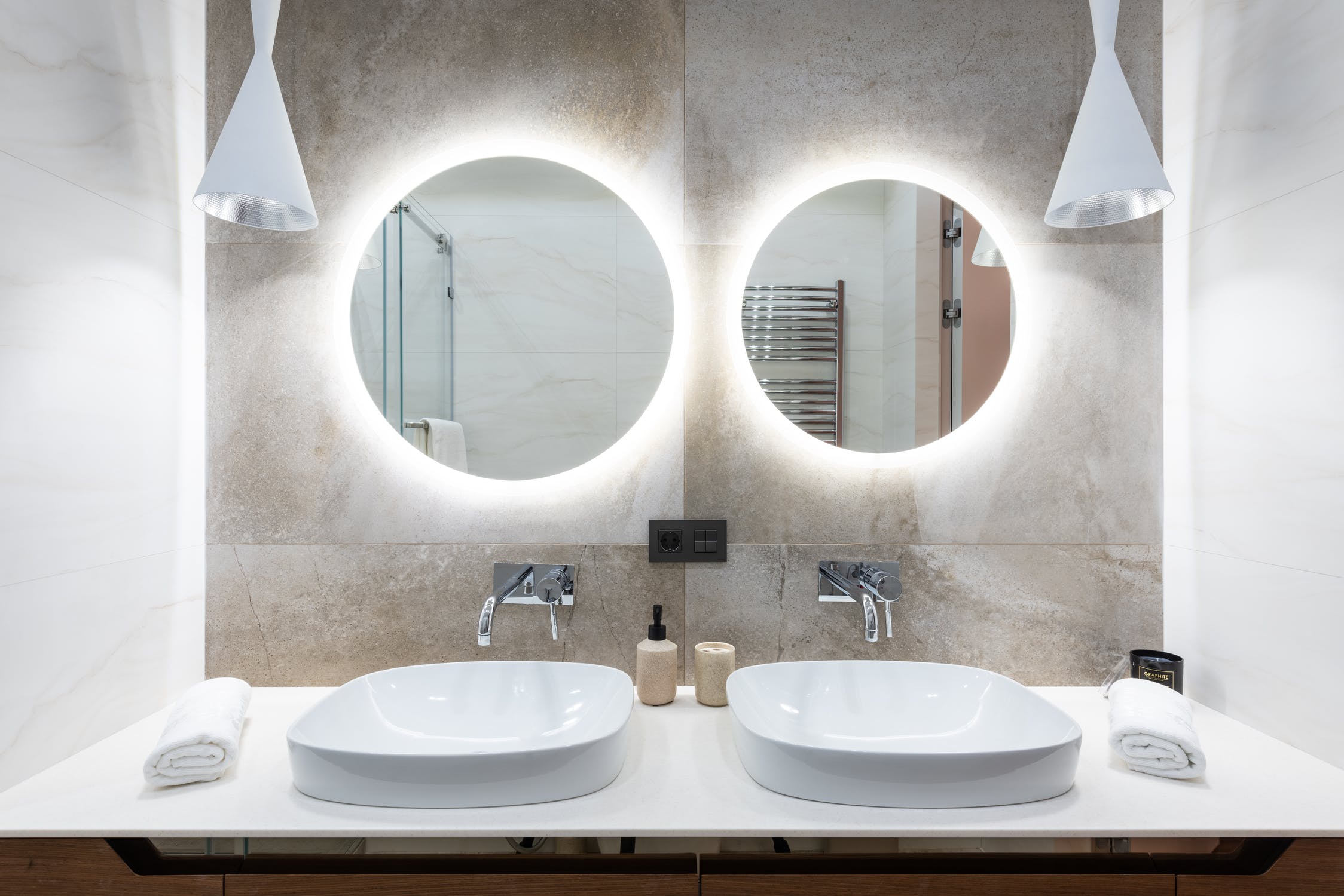 a couple of sinks in a bathroom