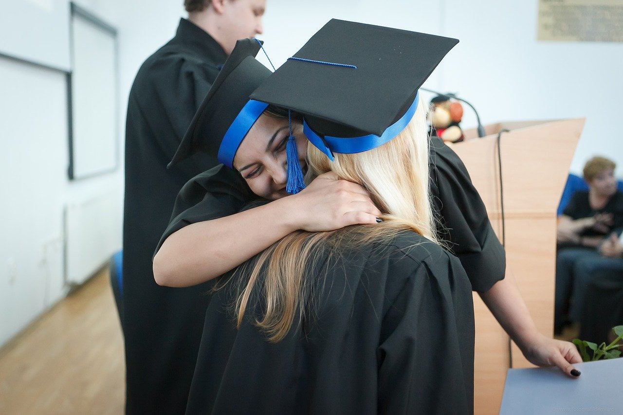 a person wearing a graduation cap